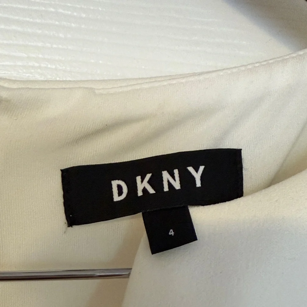 BCBGMaxAzria Ivory Sleeveless Midi Dress - Picture 2 of 4